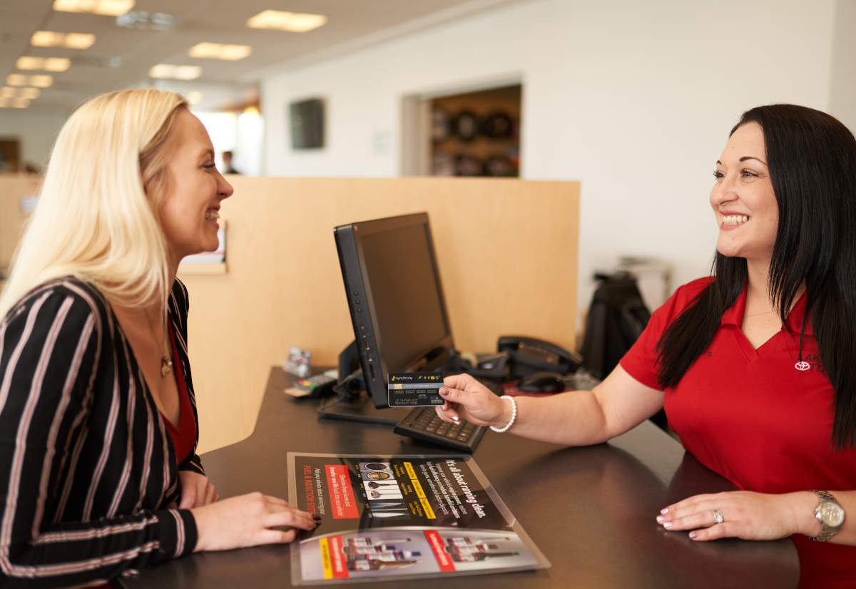 Lakeland Toyota assistant service manager with a customer